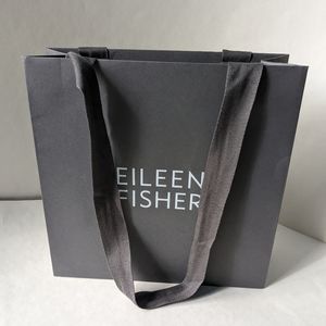Eileen Fisher gray paper shopping bag with fabric handles